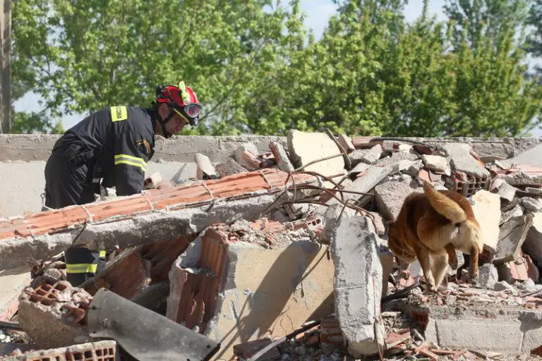 At Least 32 Dead, Dozens Trapped in Collapsed Building
